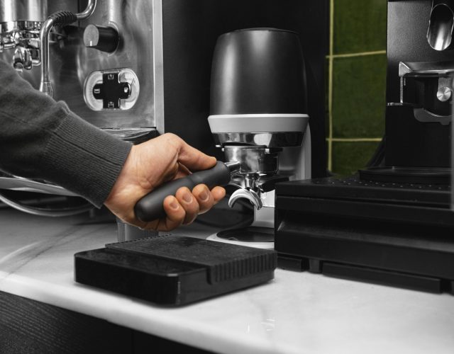 close up hand holding handle